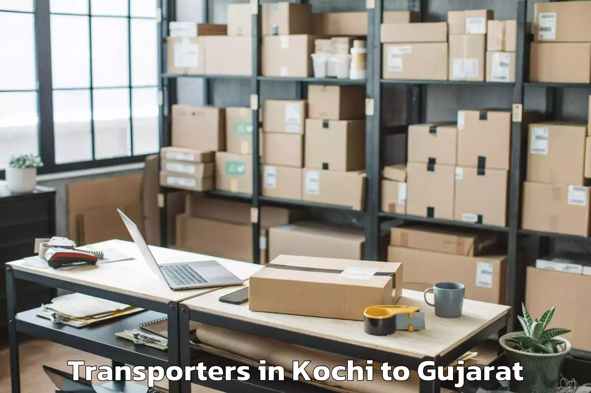 Top Kochi to Jetpur Transporters Available